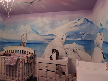 Mural of North Pole animals in a child's room.