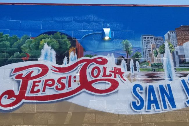 Pepsi bottle and logo mural on the outside of a convenience store in San Jose. Bay Area Muralist.