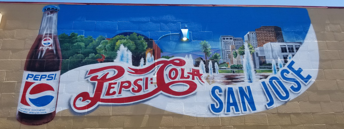 Pepsi bottle and logo mural on the outside of a convenience store in San Jose. Bay Area Muralist.